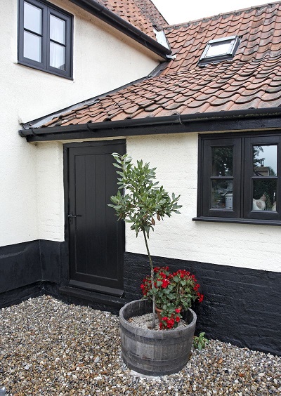 Black Horizontal bar windows and Black external framed T & G Type Wooden Door